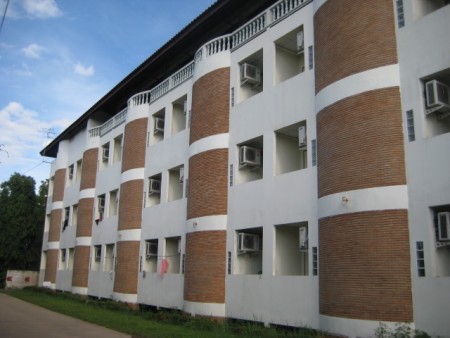 4-story apartment building on river