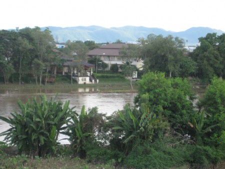 4-story apartment building on river