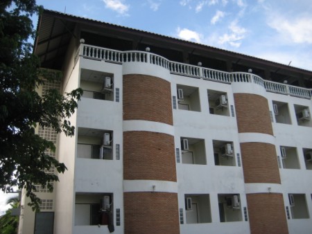 4-story apartment building on river